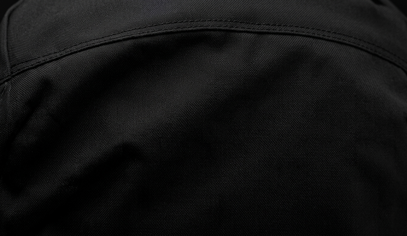 Close-up of Lumen Jacket durable construction details